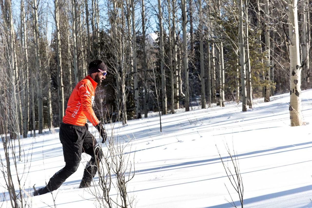Eric Young breaks trail on the way up Sheep Mountain.