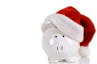 Piggy bank with a santa hat on