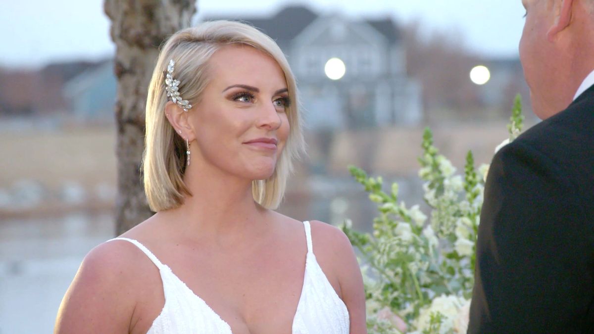 Whitney Rose in white dress with husband on The Real Housewives of Salt Lake