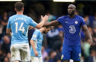 Chelsea’s Romelu Lukaku (right) and Manchester City’s Aymeric Laporte shake hands after the Premier League match at Stamford Bridge, London. Picture date: Saturday September 25, 2021