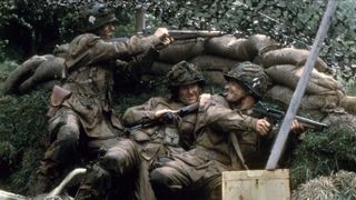 Damian Lewis, Scott Grimes and John Hughes in a foxhole in Band of Brothers
