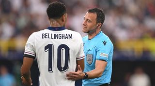 England midfielder Jude Bellingham is spoken to by referee Felix Zwayer during the Euro 2024 semi-final against the Netherlands.