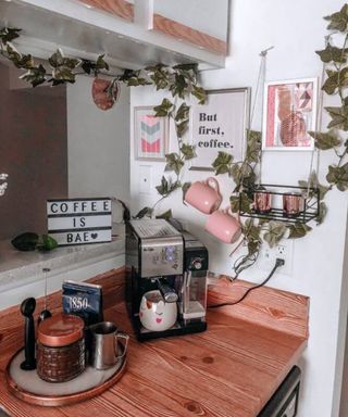 A DIY coffee bar idea with faux wooden contact paper and coffee bar accessories