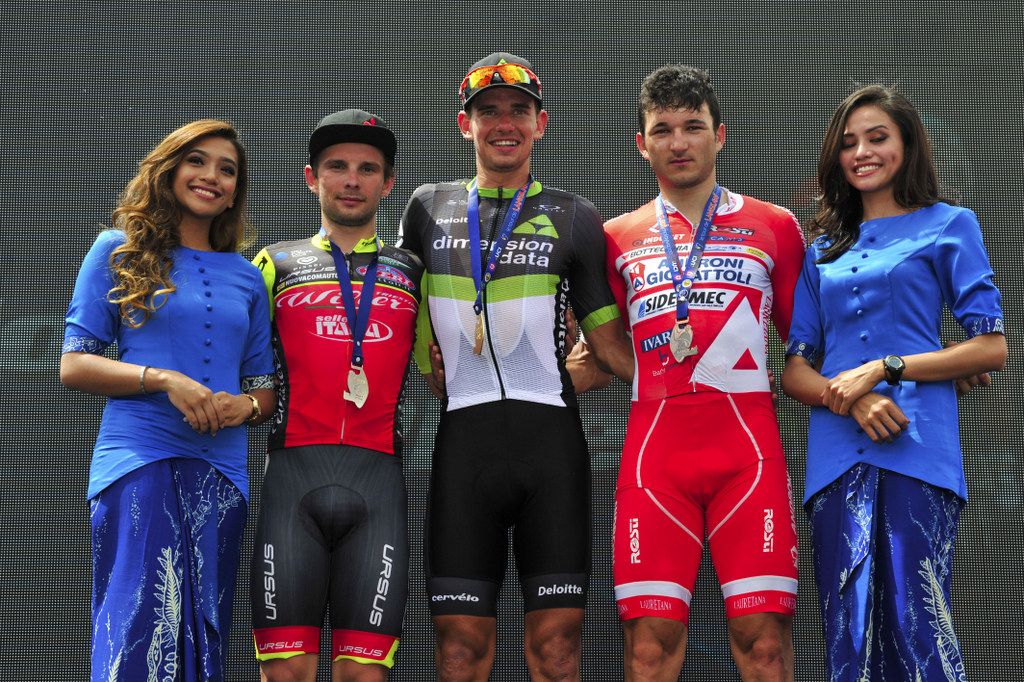 The top three from stage 5 on the podium
