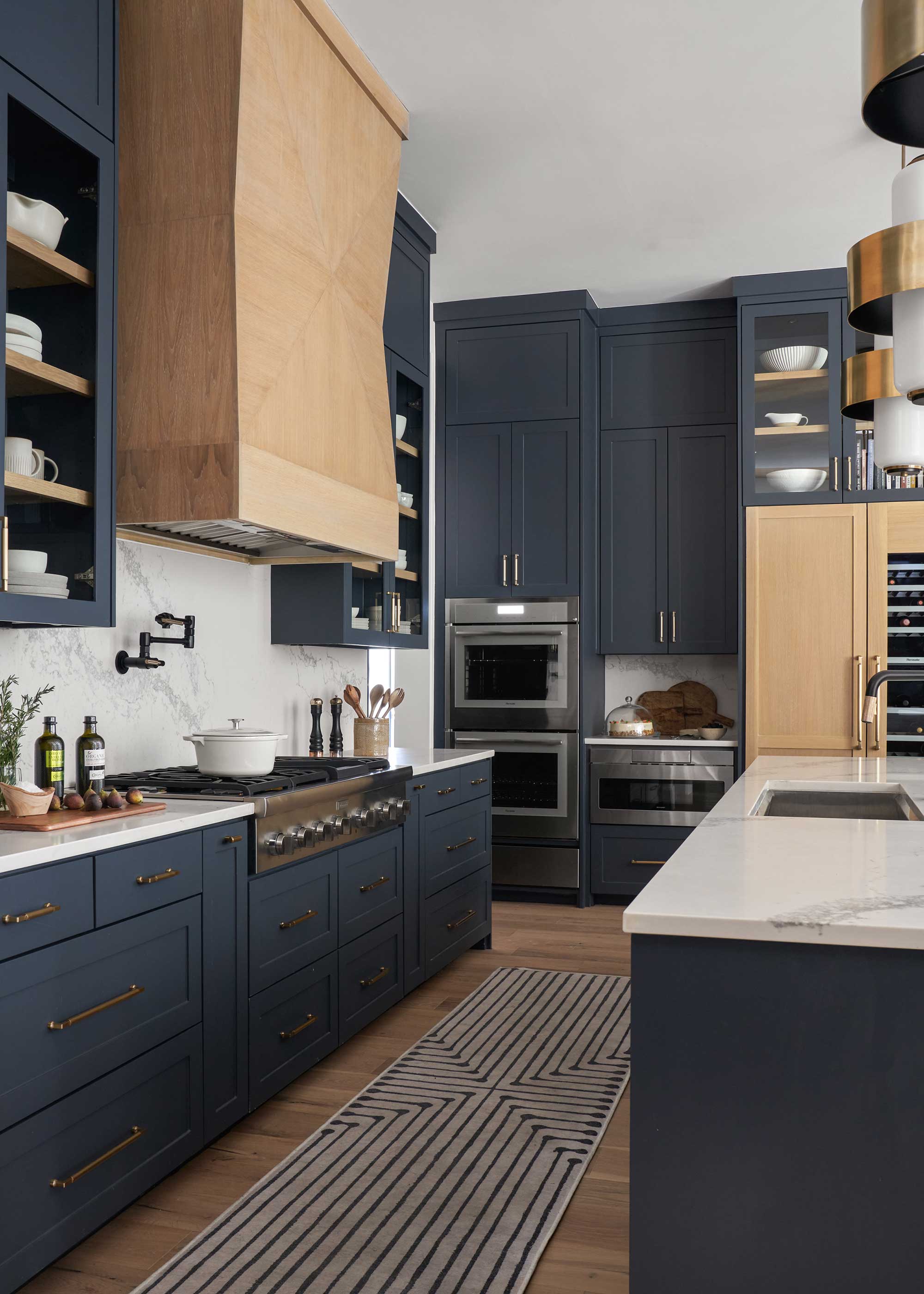navy blue kitchen with full height cabinets