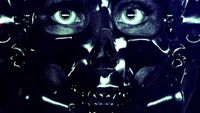 Brigador soundtrack cover art showing feminine face covered by skull mask in monochrome.