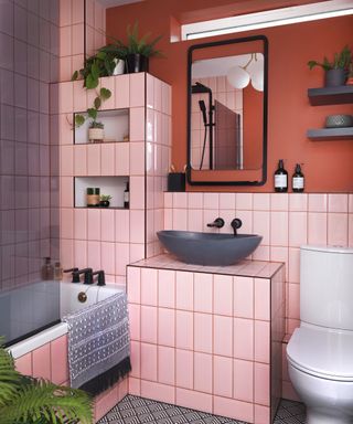 pink and terracotta bathroom scheme with striking contrast