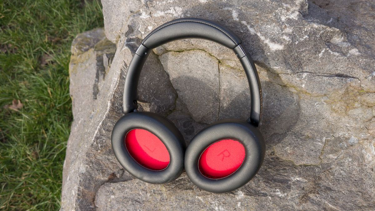 1More Sonoflow Pro showing off their red earcups on a big rock in the sun