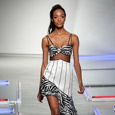 Model wearing zebra stripes, on the catwalk