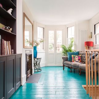Garden room with blue wooden flooring