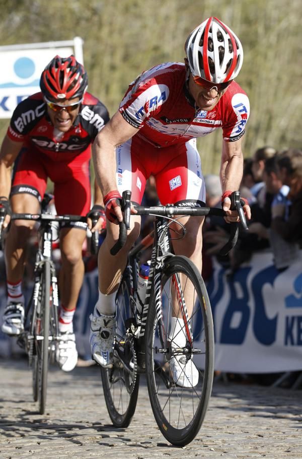Luca Paolini (Team Katusha) leads Greg Van Avermaet (BMC) on the Kemmelberg