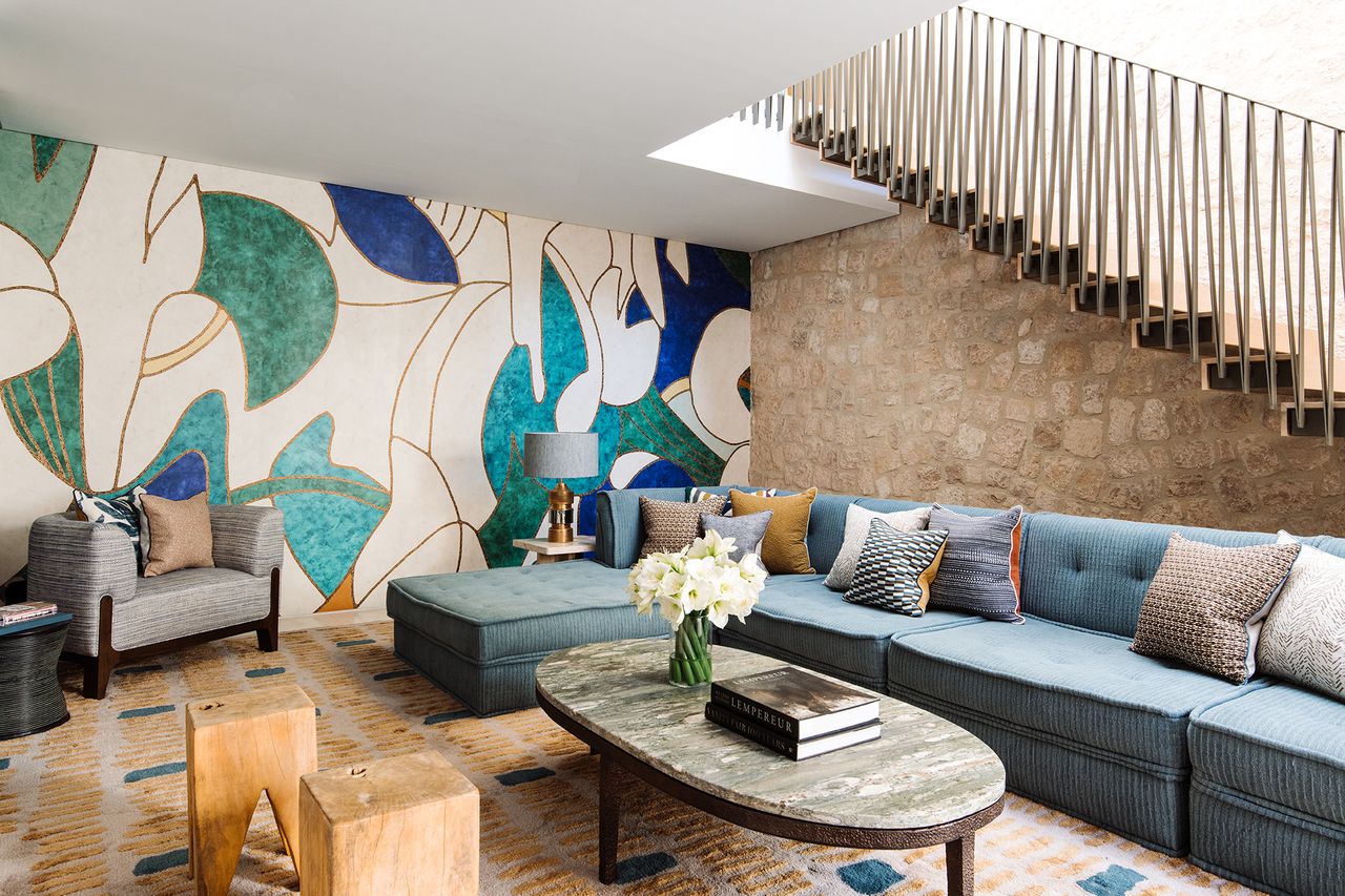 Living room with colorful patterned carpet