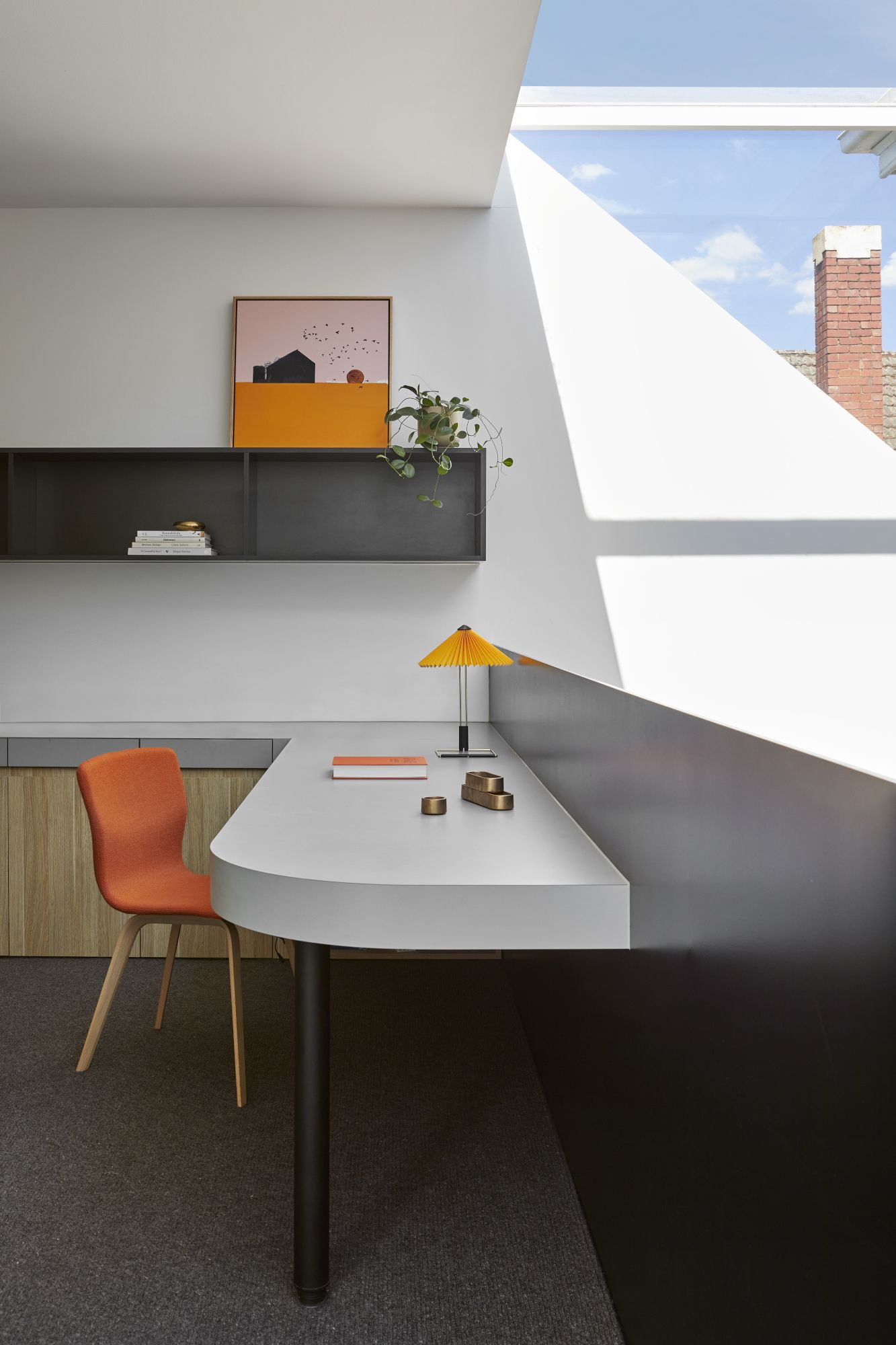 Built-in desk over mezzanine