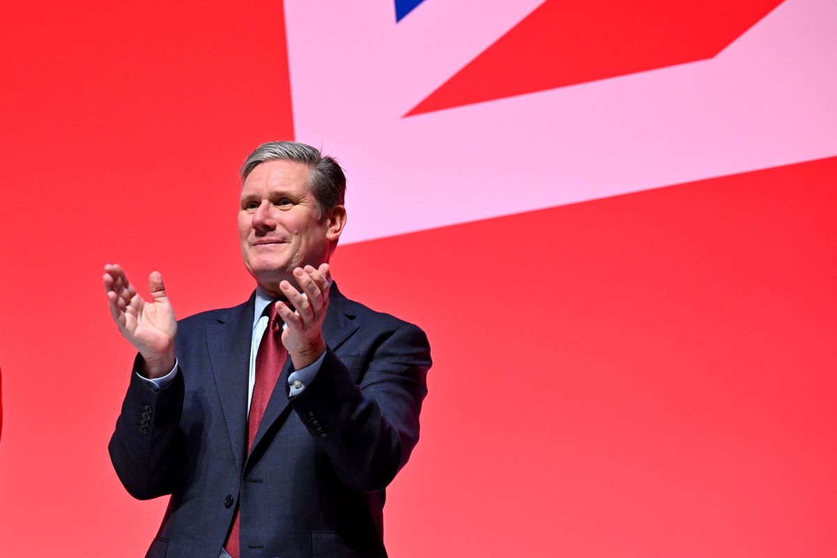 Keir Starmer clapping at the Labour party conference 2023