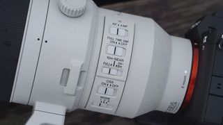 Closeup of the Sony FE 400-800mm F6.3-8 G OSS supertelephoto zoom lens's external controls