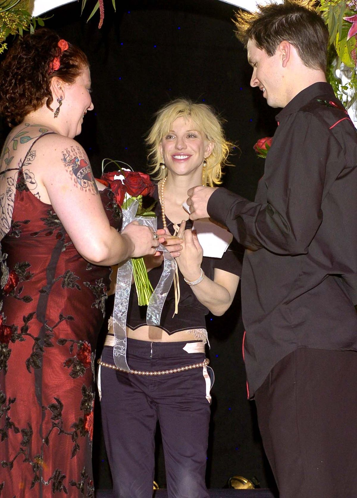 Ordained in the Universal Life church, Courtney Love performed the marriages of 21 lucky competition winners in Lake Tahoe, Nevada.