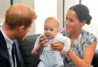 baby archie with parents Meghan and harry