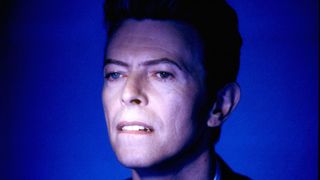 David Bowie against a blue background