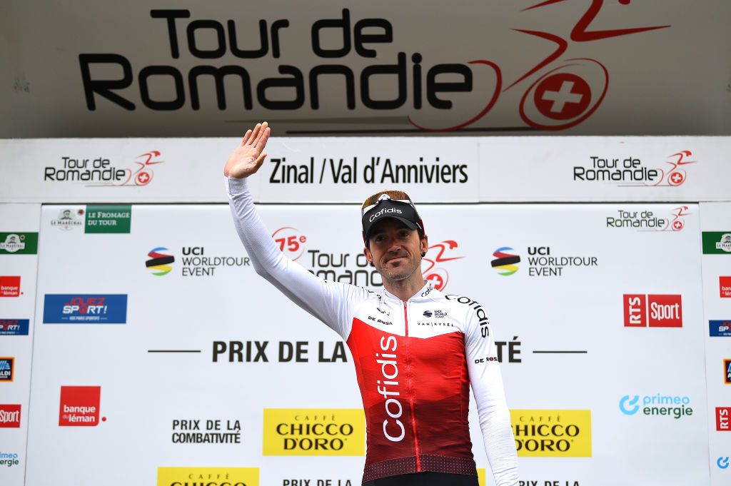 ZINAL VAL DANNIVIERS SWITZERLAND APRIL 30 Ion Izagirre Insausti of Spain and Team Cofidis celebrates at podium as most combative rider prize winner during the 75th Tour De Romandie 2022 Stage 4 a 1801km stage from Aigle to Zinal Val dAnniviers 1664m TDR2022 on April 30 2022 in Zinal Val dAnniviers Switzerland Photo by Dario BelingheriGetty Images