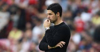 Arsenal manager Mikel Arteta reacts during the Premier League match between Arsenal FC and Brighton & Hove Albion at Emirates Stadium on May 14, 2023 in London, England.