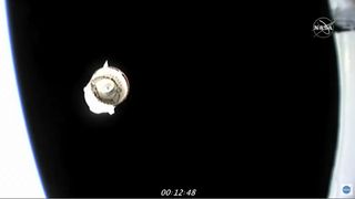 SpaceX's first upgraded Cargo Dragon spacecraft is seen after separating from its Falcon 9 rocket following a successful launch toward the International Space Station for NASA on Dec. 6, 2020.