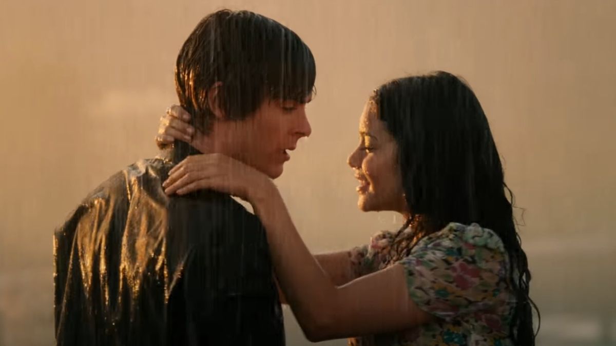 Zac Efron and Vanessa Hudgens dancing in the rain.