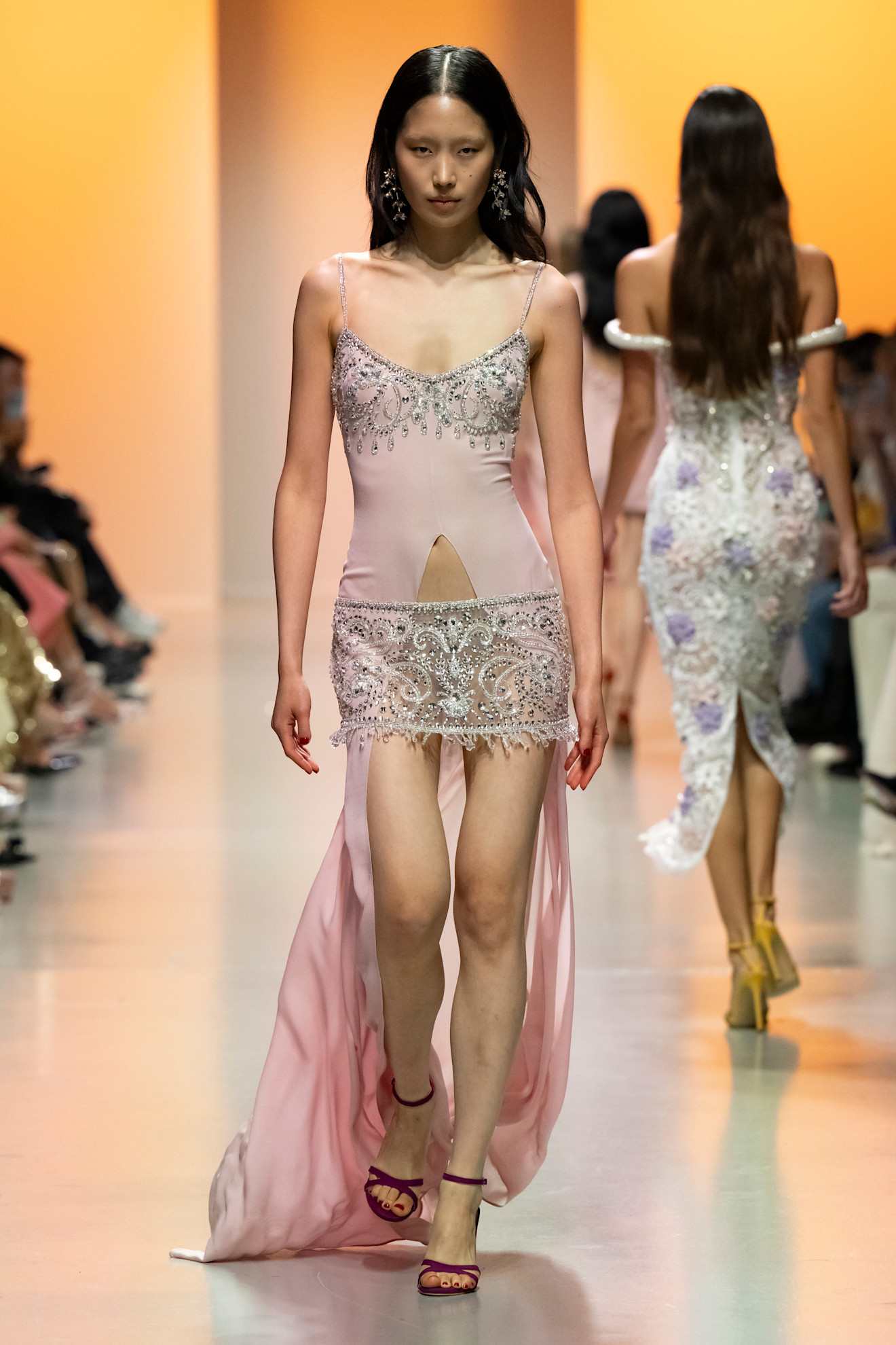Megan from Katseye's runway look on the Georges Hobeika runway