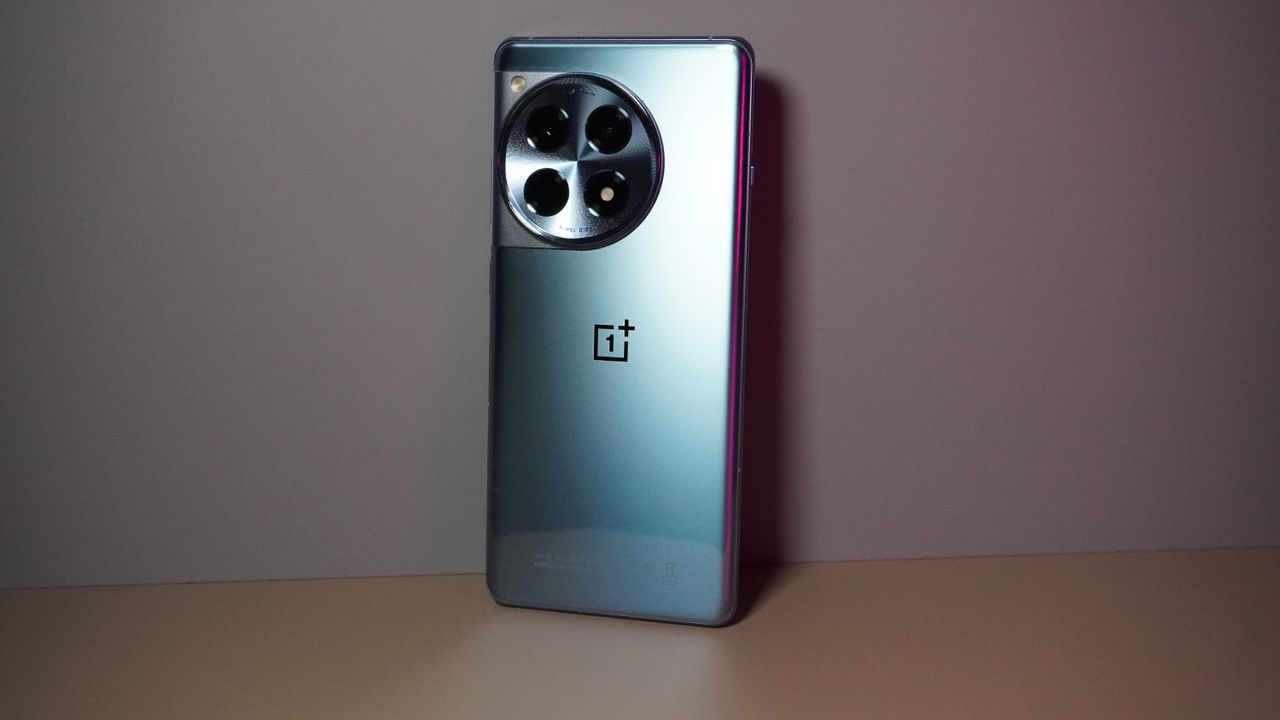 The OnePlus 12R on a pink background