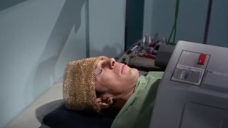 Spock lying unconscious in an episode of Star Trek