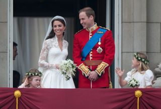 Kate Middleton and Prince William on the Buckingham Palace balcony during their wedding