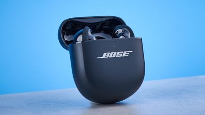 the bose quietcomfort ultra earbuds 2nd gen against the blue tom's guide background