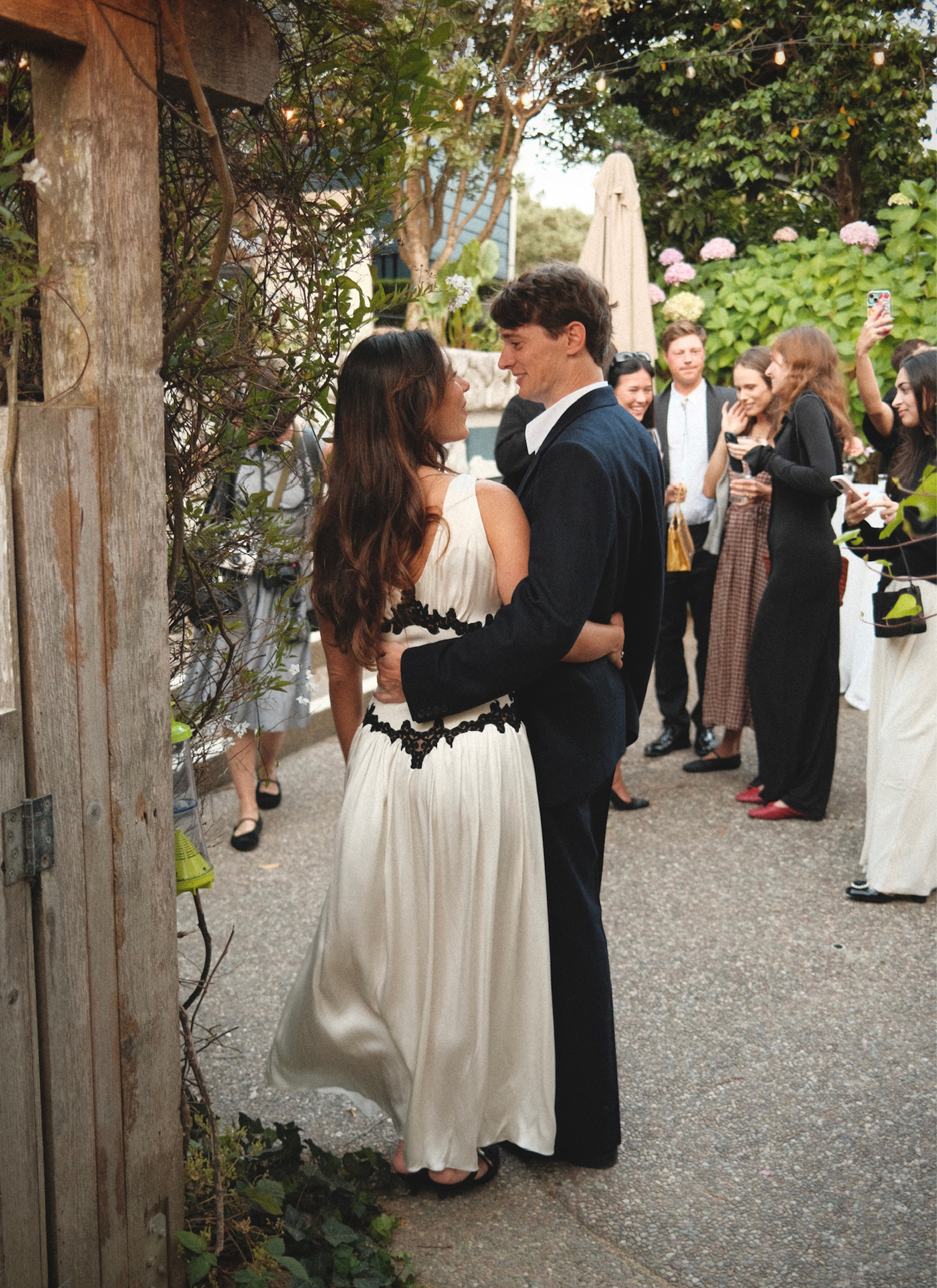 Charles and Hadley hugging at the welcome party.