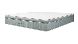 Image shows the Brooklyn Bedding EcoSleep Luxe Hybrid Mattress with white sustainable top cover and grey base housing all-natural latex foam and coils