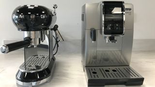 De'Longhi Dinamica Plus beside the Smeg espresso maker on a marble countertop
