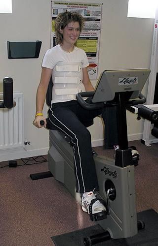 Emma Davies on the exercise bike