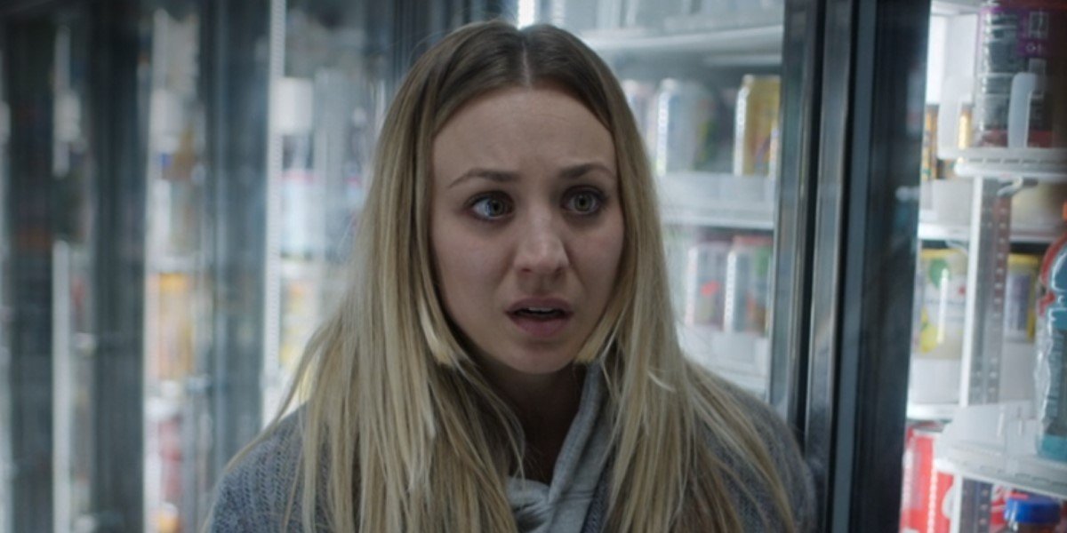 kaley cuoco&#039;s cassie standing in convenience store cooler section on the flight attendant