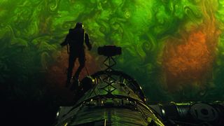 Ryland Grace in his spacesuit hovering in front of the Adrian planet in Project Hail Mary
