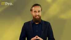 Presenter Ant Joblin on a yellow background talking to the camera