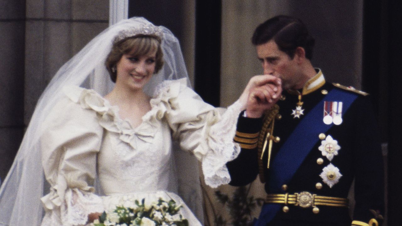 the prince and princess of wales on the balcony of buckingham palace on their wedding day, 29th july 1981 diana wears a wedding dress by david and elizabeth emmanuel and the spencer family tiara photo by terry fincherprincess diana archivegetty images