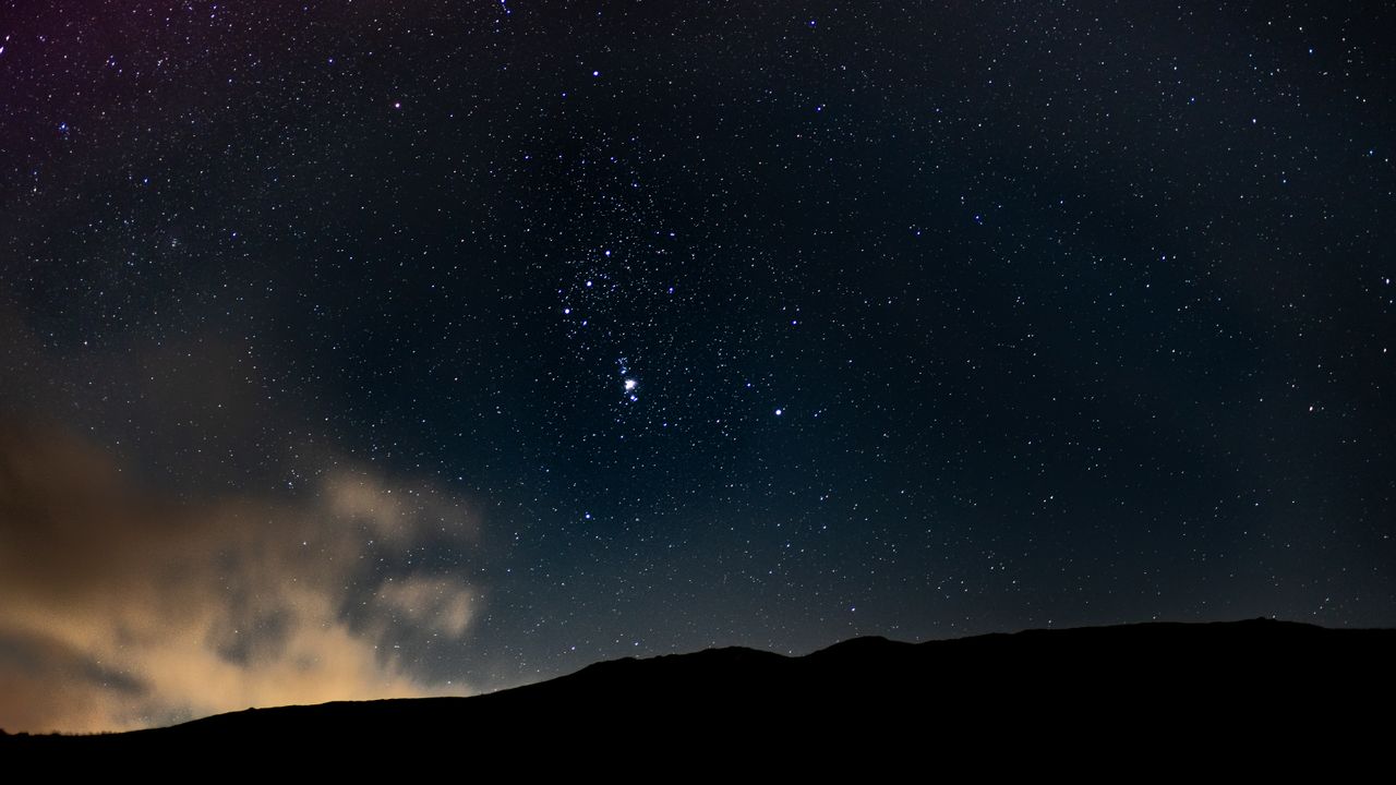 Orion constellation over the countryside