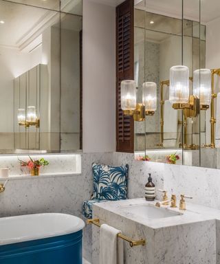 LED-bathroom-lighting-ideas-Drummonds-Barlow-and-Barlow, mirrored bathroom, wall lights, marble, vanity