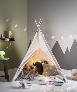 Children's playroom tipi with bulb lighting by Lights4un
