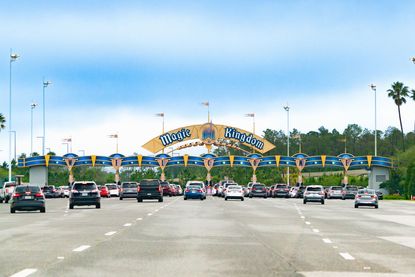 Cars wait to enter the Magic Kingdom at Disney World in 2022