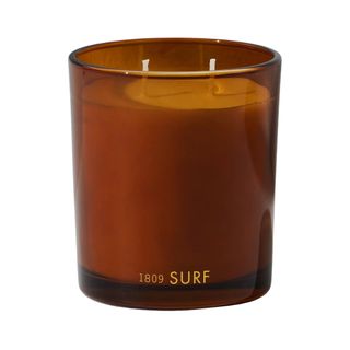 Free People 2-wick Surf candle in amber colored glass vessel