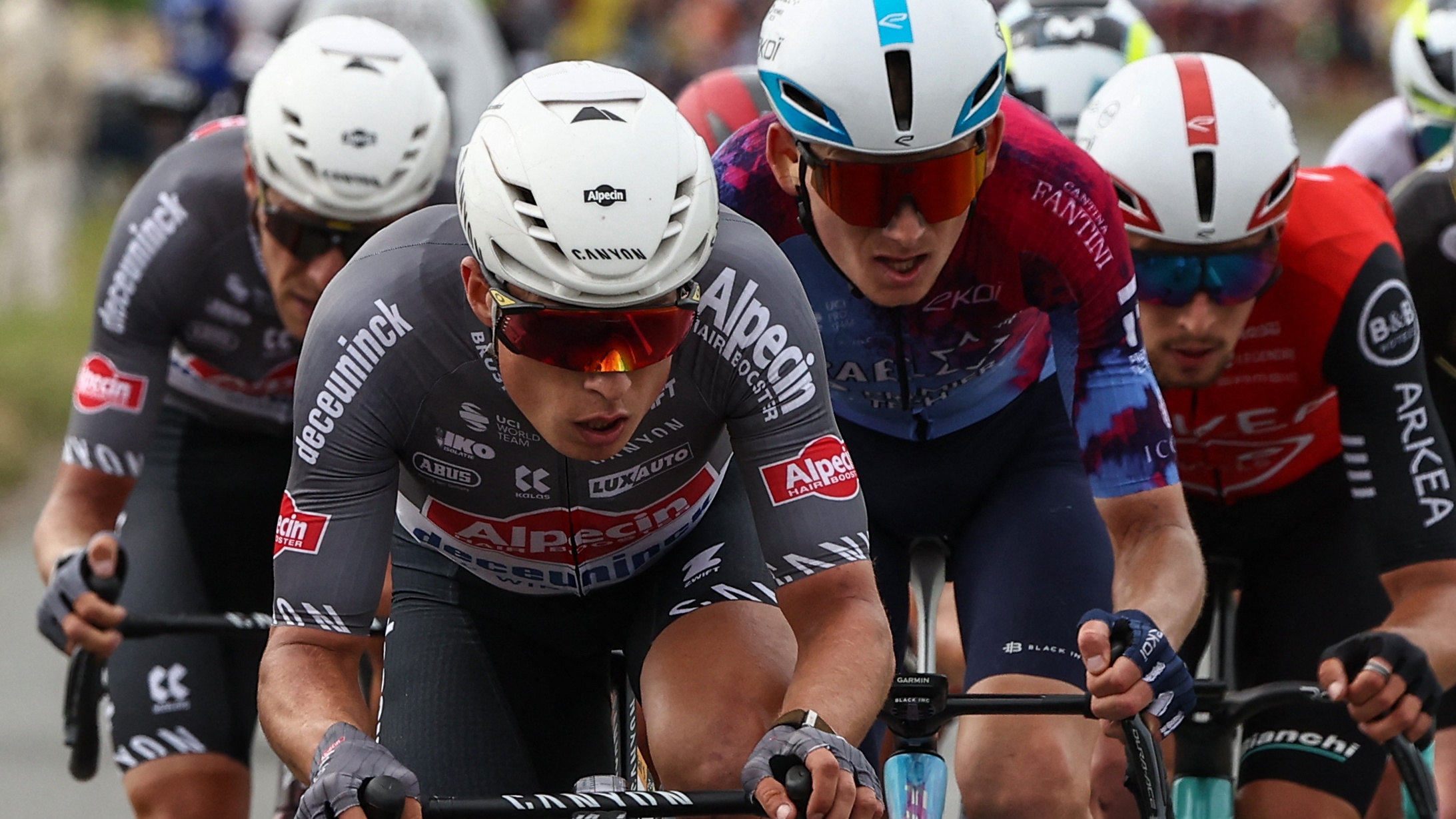 Alpecin - Deceuninck team's Belgian rider Jasper Philipsen cycles with the pack of riders (peloton) during the 1st stage of the 112th edition of the Tour de France cycling race, 184.9 km starting and finishing in Lille Metropole