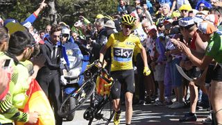 Chris Froome runs up the Mont Ventoux