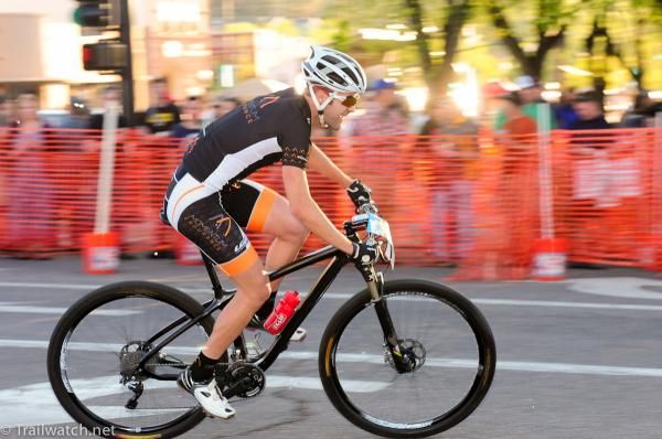 TJ Woodruff (Momentum Endurance) riding through the town square