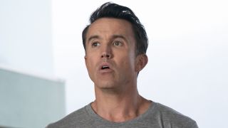 Mac in gray shirt at dog track in I't s Always Sunny in Philadelphia Season 17