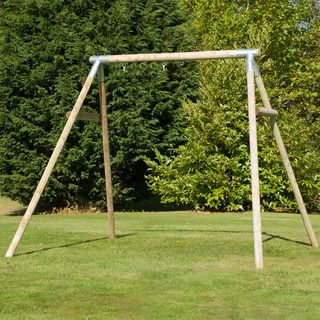 wooden swing frame in garden