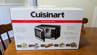 The Cuisinart CMW-70 Microwave Oven arrives in a box.